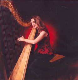 Leah in red and seated